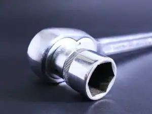 Socket fitted to a wrench