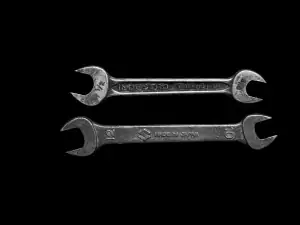 Open-end spanners on a dark background